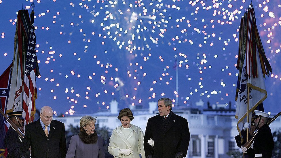 George W Bush, his wife Laura Bush, Dick Cheney and Lynne Cheney watch fireworks as part of inaugural celebrations