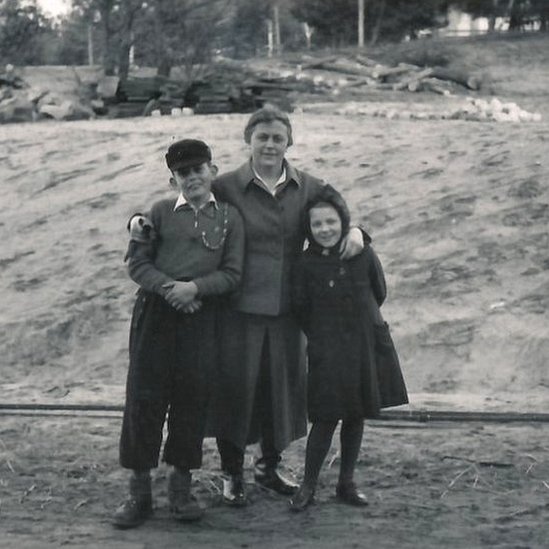 Female guard Johanna Langefeld with her son and another guard's daughter