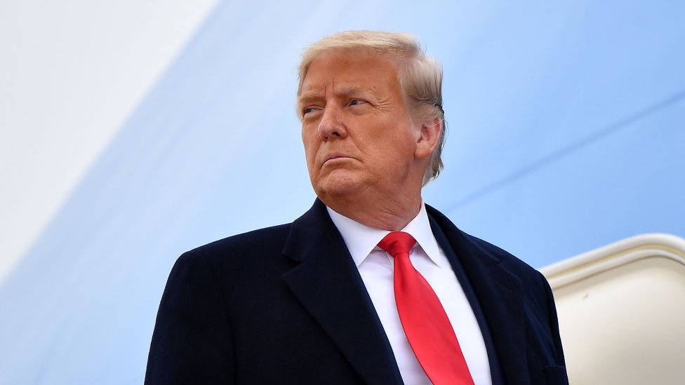 US President Donald Trump boards Air Force One before departing Harlingen, Texas on January 12, 2021.