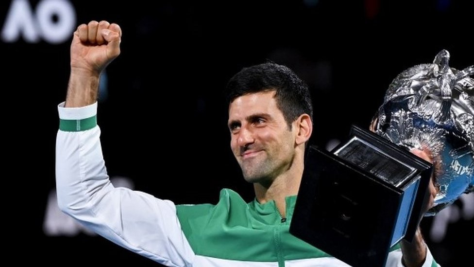 Novak Djokovic celebrates winning the 2021 Australian Open