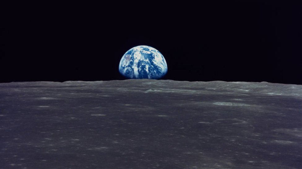 Earth rise, photographed by Apollo 11 on July 1969.
