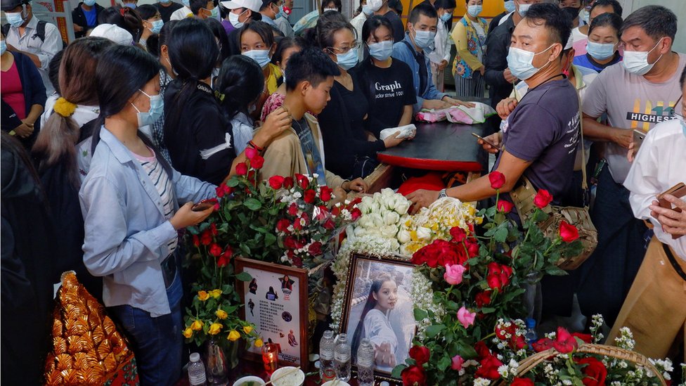 People attend the funeral of Angel, 19-year-old protester also known as Kyal Sin