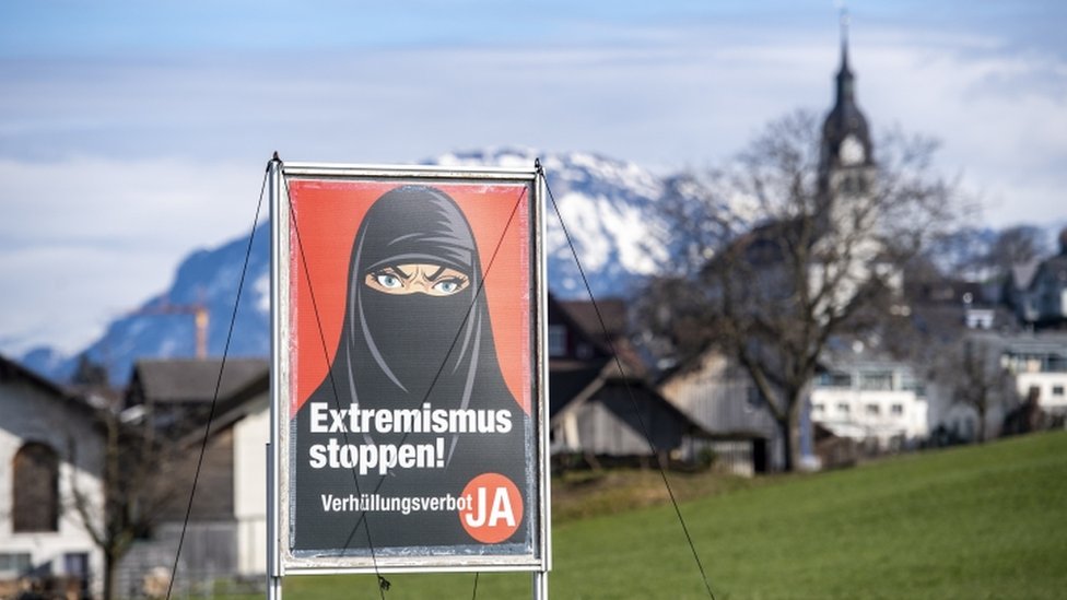 A poster promoting "Yes to the burka ban" is seen in Oberdorf, in the canton of Nidwalden, Switzerland, 16 February 2021