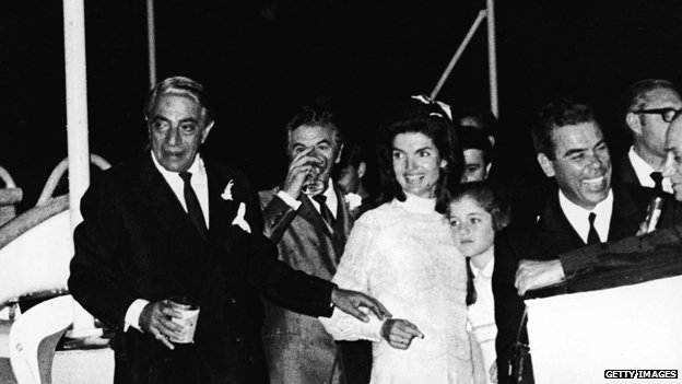 Jacqueline Kennedy Onassis with her daughter, Caroline Kennedy, and her new husband, Greek shipping magnate Aristotle Onassis after their wedding