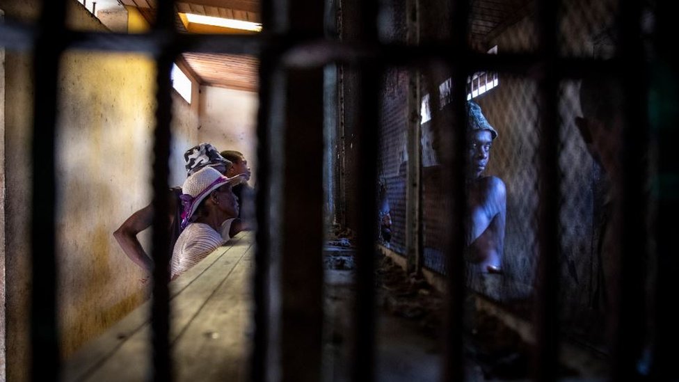 A prisoner meeting his family members