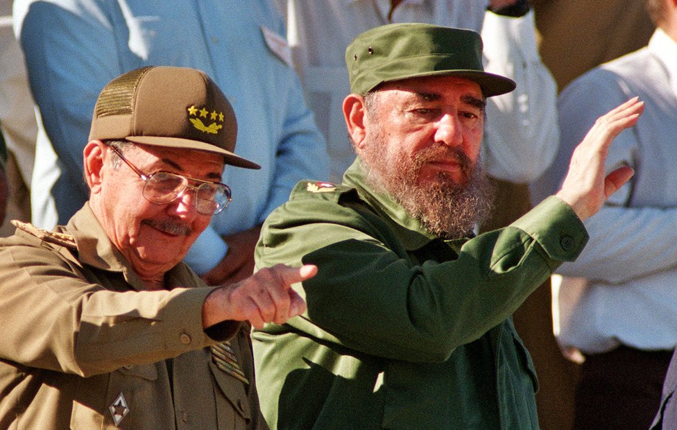 Fidel Castro and his brother Raul attend a May Day parade December 2, 1996 in Havana, Cuba. (Photo by Sven Creutzmann/Mambo Photography/Getty Images)