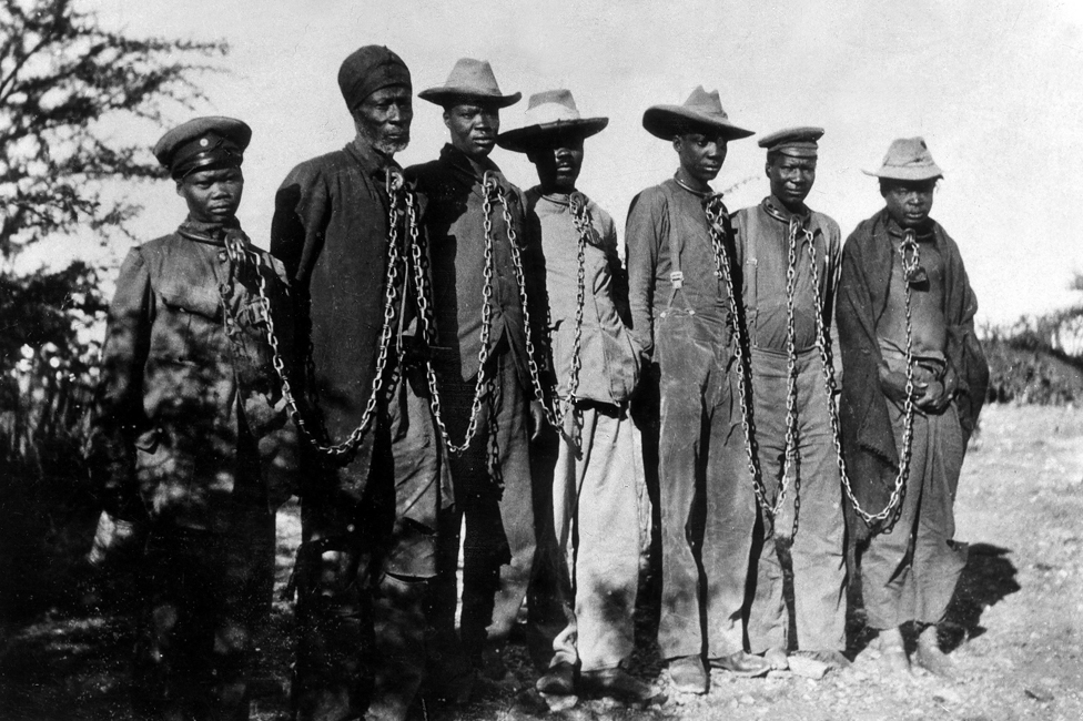Herero prisoners in chains (1904)