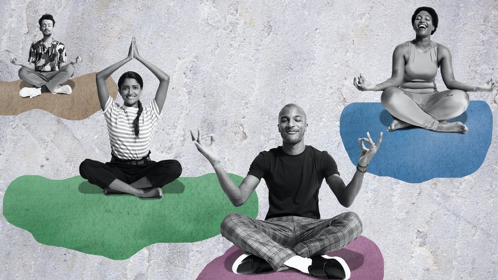 Concept image: a group of people meditating on clouds