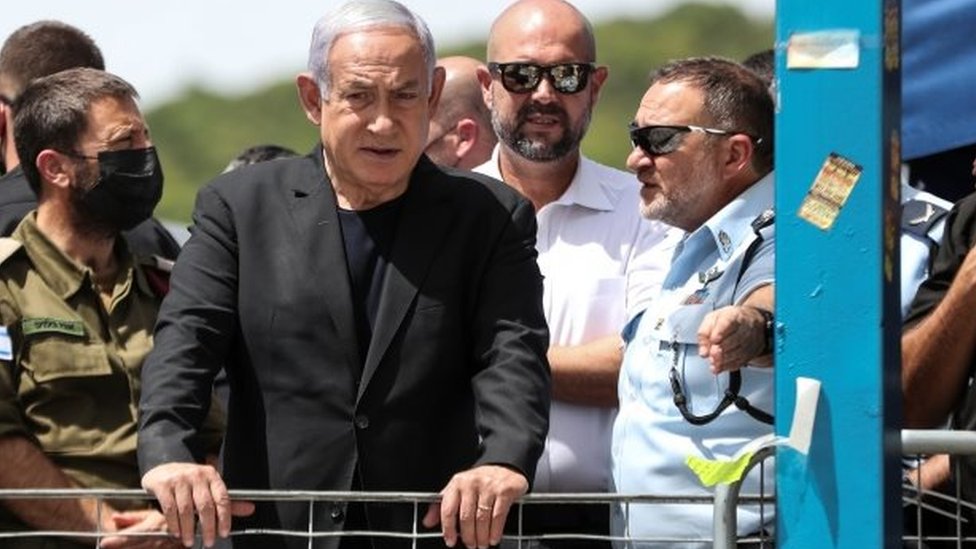 Benjamin Netanyahu visits the scene in Mount Meron. He called the deaths a "heavy disaster"