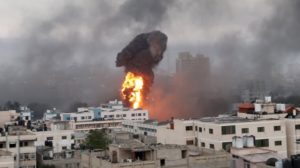 Smoke and flames rise during Israeli air strikes amid a flare-up of Israeli-Palestinian violence in Gaza