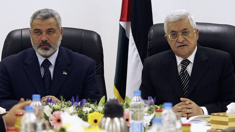 Palestinian Prime Minister Ismail Haniyeh and Palestinian President Mahmoud Abbas chair the first meeting of the new Palestinian unity government on 18 March 2007 in Gaza City
