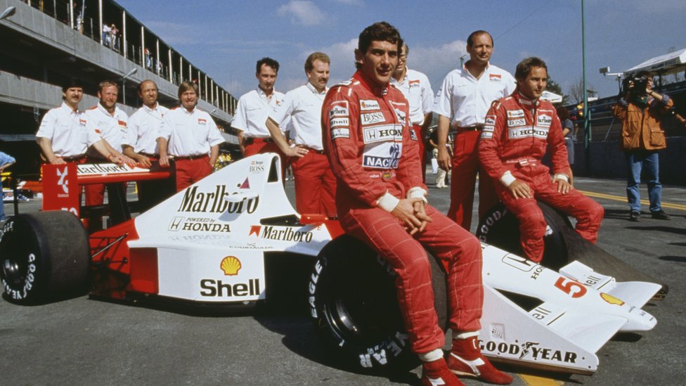 Ayrton Senna and McLaren team, pictured in 1990