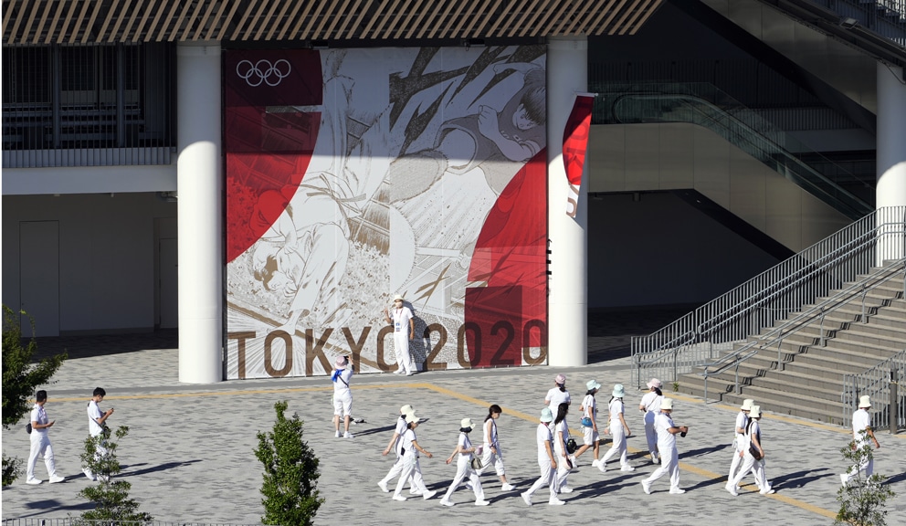 Japan će ograničiti bolničko lečenje na teže kovid bolesnike usred rekordnog broja zaraženih 1