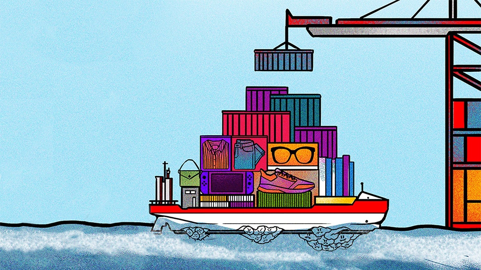 A ship full of cargo containers at sea with mountains of barnacles stuck to its bottom side