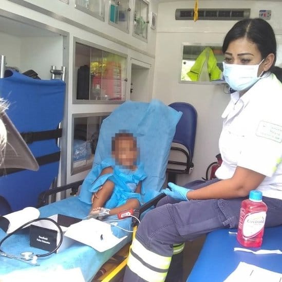 Wilder Ladino receiving medical care in an ambulance