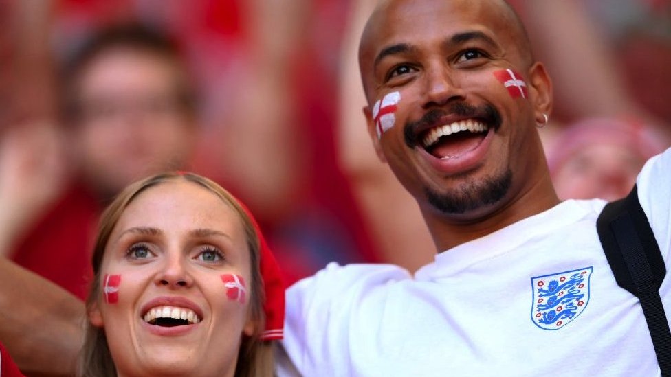 A Danish fan and England fan