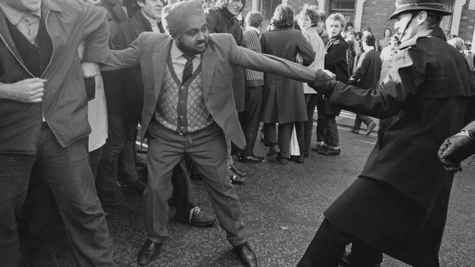 Anti-apartheid demonstrators in the UK clash with police following a rugby match with a South African team in 1969.