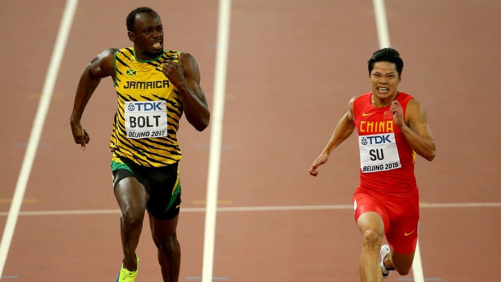 Bingtian Su, here seen racing alongside Usain Bolt on the 2015 World Championships