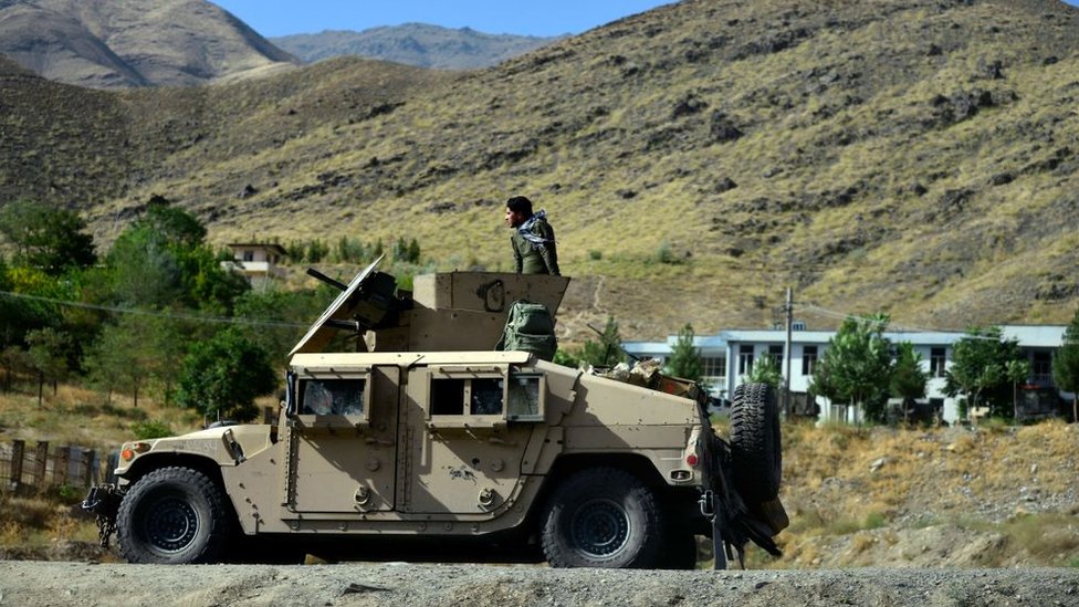An armoured vehicle patrolling in a mountainous area