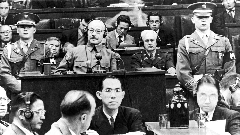 Former Japanese Prime Minister Hideki Tojo seen in a court surrounded by people
