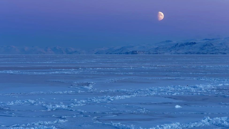 Moon over ice
