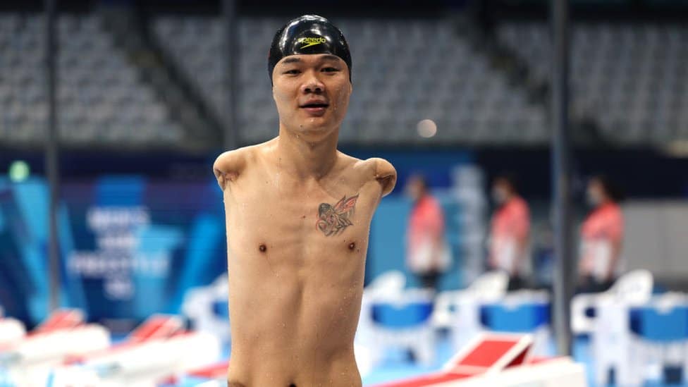 Zheng Tao of Team China reacts after competing in the Men's 50m Freestyle