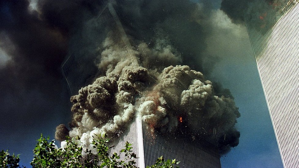 The south tower of the World Trade Center collapses September 11, 2001 in New York City.