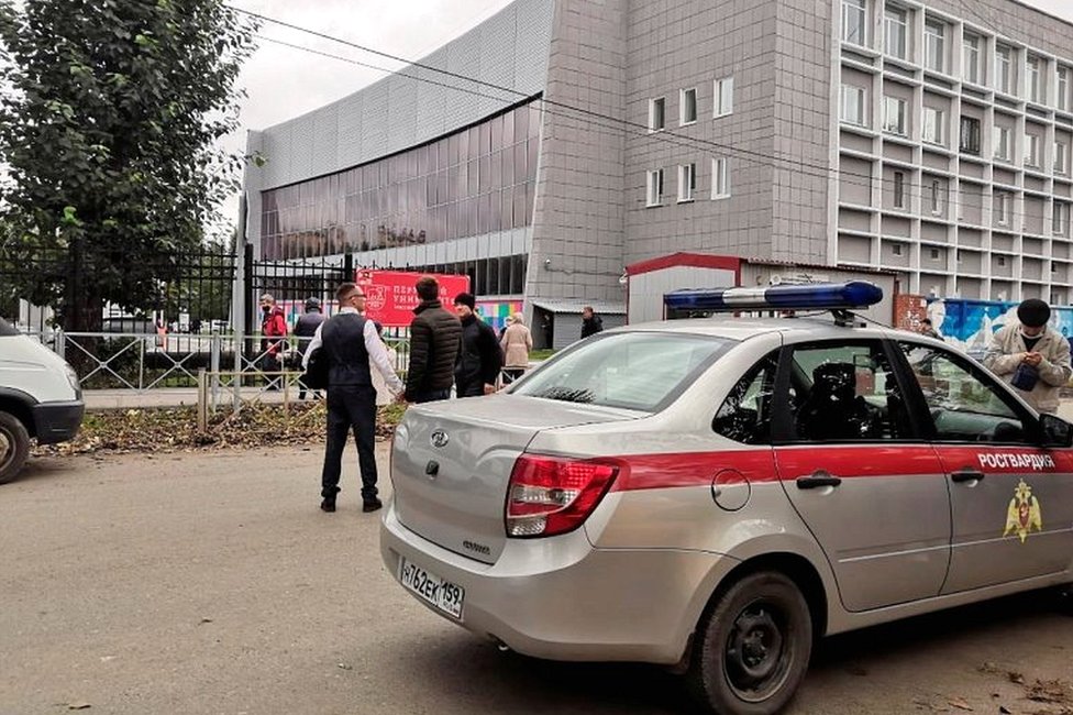 A car of Russia's National Guard is seen at the scene after a gunman opened fire at the Perm State University in Perm, Russia, on 20 September 2021