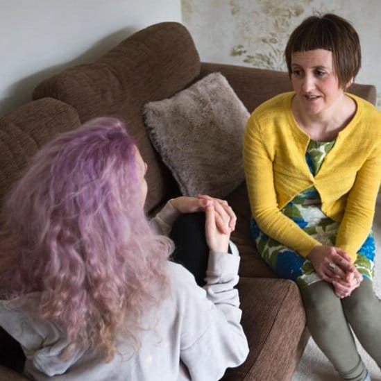 Rachel talks to her eldest daughter (who has her back to camera)