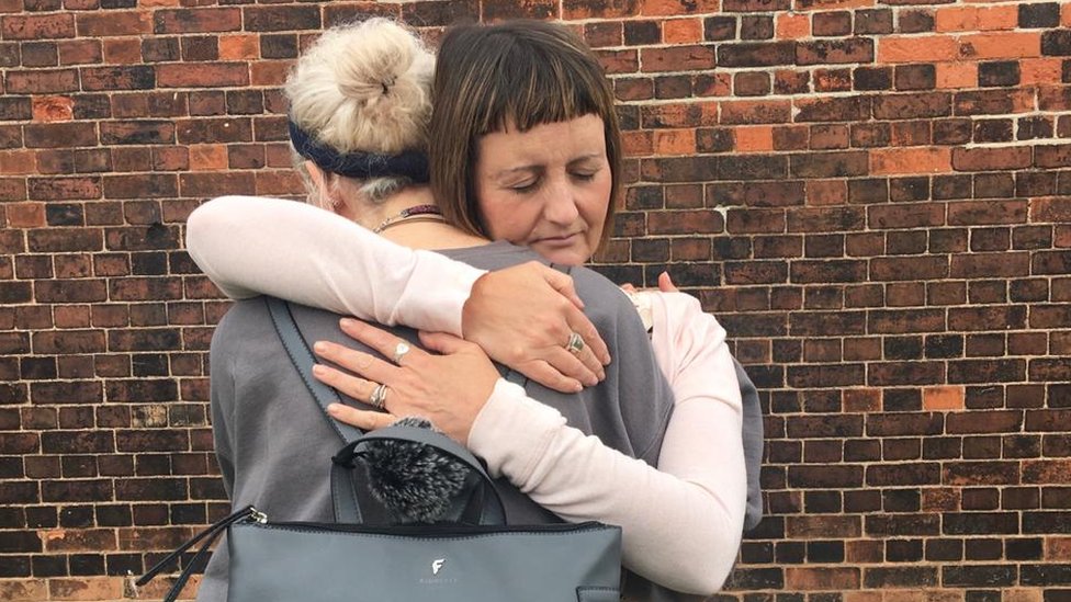 Rachel hugs her eldest daughter