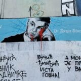 Oskrnavljen mural Zoranu Đinđicu 9
