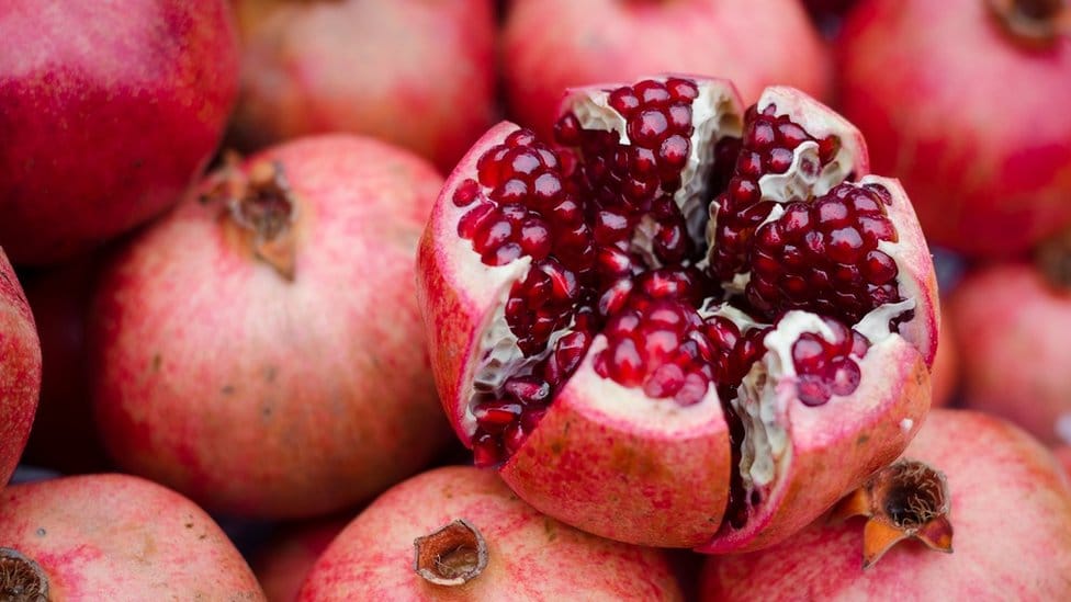 Close up of an open pomegranate.