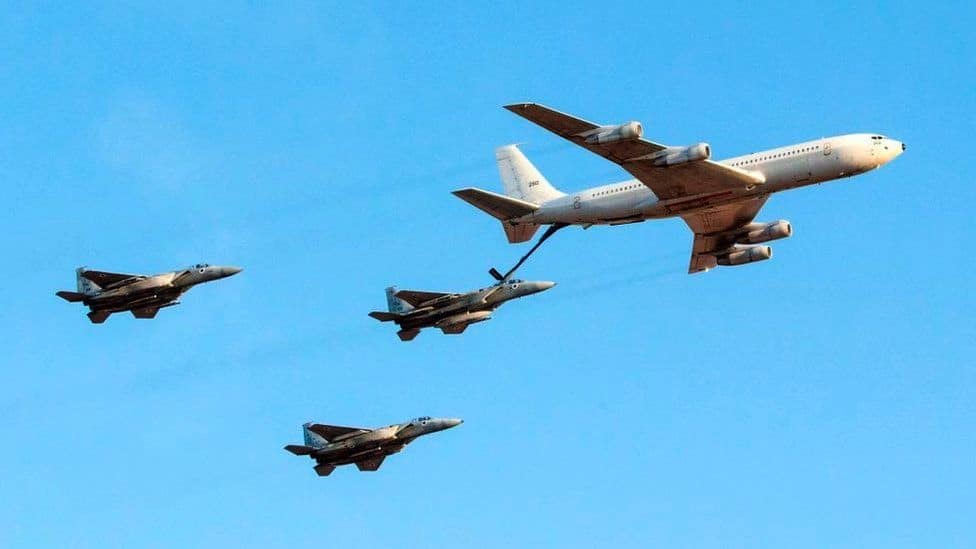 Israeli F15 jet fighters refuelling from a tanker aircraft