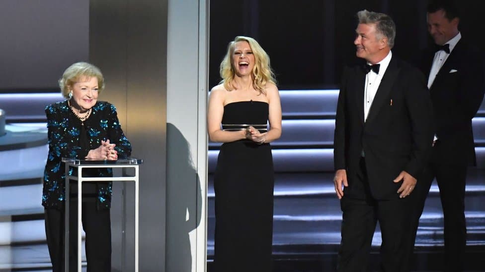 Betty White entertains, Kate McKinnon, and Alec Baldwin onstage at the Emmy Awards in 2018.