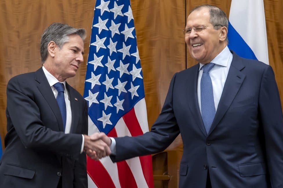 US Secretary of State Antony Blinken and Russian Foreign Minister Sergei Lavrov shake hands during bilateral talks on soaring tensions over Ukraine in Geneva, Switzerland