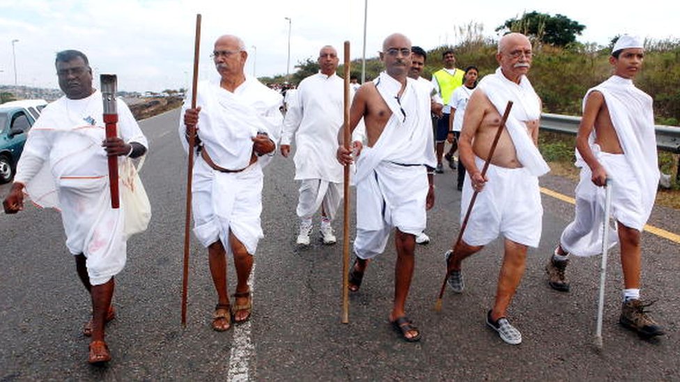 A few followers impersonate Gandhi during the annual Mahatma Gandhi Salt March on April 18, 2010 in Durban