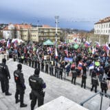 Thousands of Slovaks rally to protest a defense military treaty between this NATO member and the United States, in Bratislava, Slovakia, Tuesday, Feb. 8, 2022. Waving national flags, the protesters gathered in front of the Parliament that was debating the Defense Cooperation Agreement. (