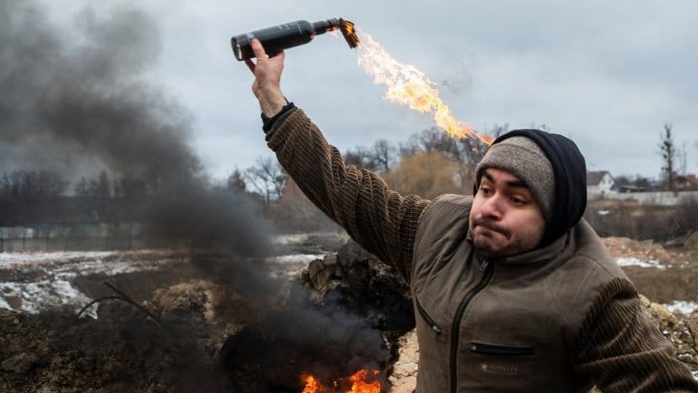A Ukraine civilian trains to throw Molotov cocktails