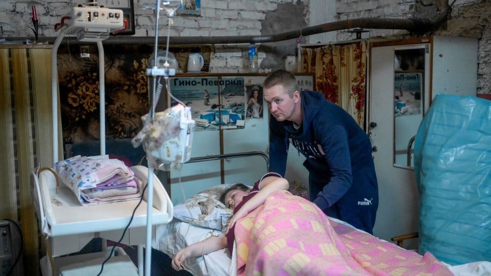 A mother waits to give birth in a hospital basement in Mykolaiv