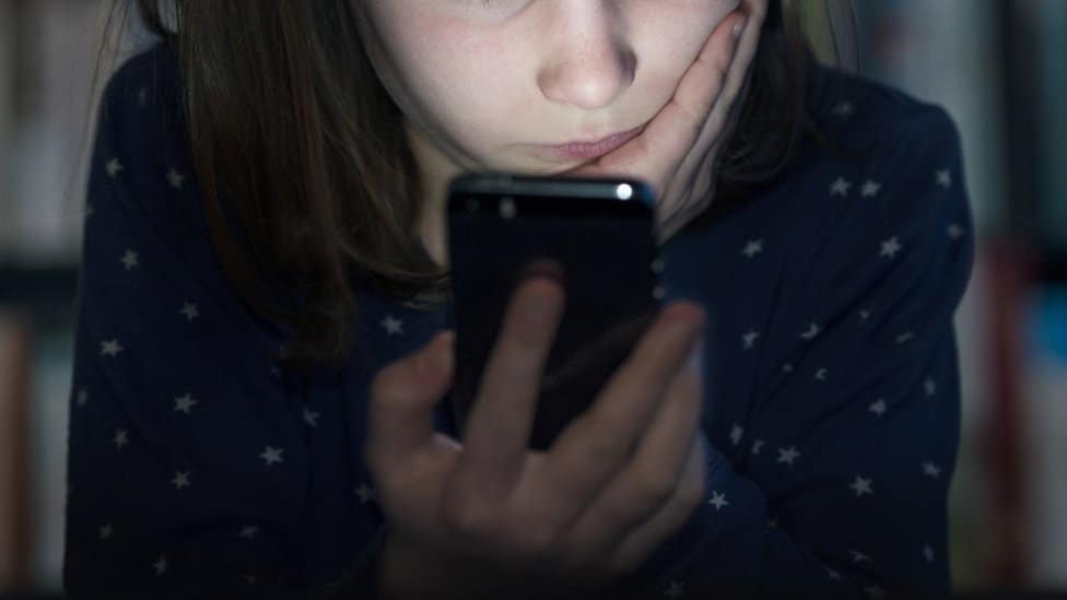 Girl looking at phone