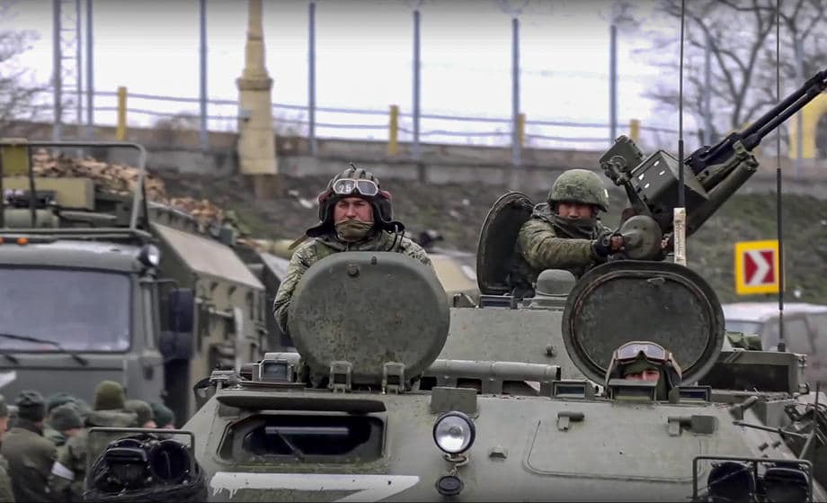 epa09807294 A still image taken from a handout video made available by the Russian Defence Ministry press service shows Russian servicemen drive on armoured military vehicles on the road near Kyiv (Kiev), Ukraine, 07 March 2022. Russian President Putin on 24 February 2022 announced a "special military operation against Ukraine". Martial law has been introduced in Ukraine, and explosions are heard in many cities including Kyiv. EPA-EFE/RUSSIAN DEFENCE MINISTRY PRESS SERVICE/HANDOUT HANDOUT HANDOUT EDITORIAL USE ONLY/NO SALES