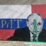 Unakažen mural Putinu, farbom pogođen posred čela 3