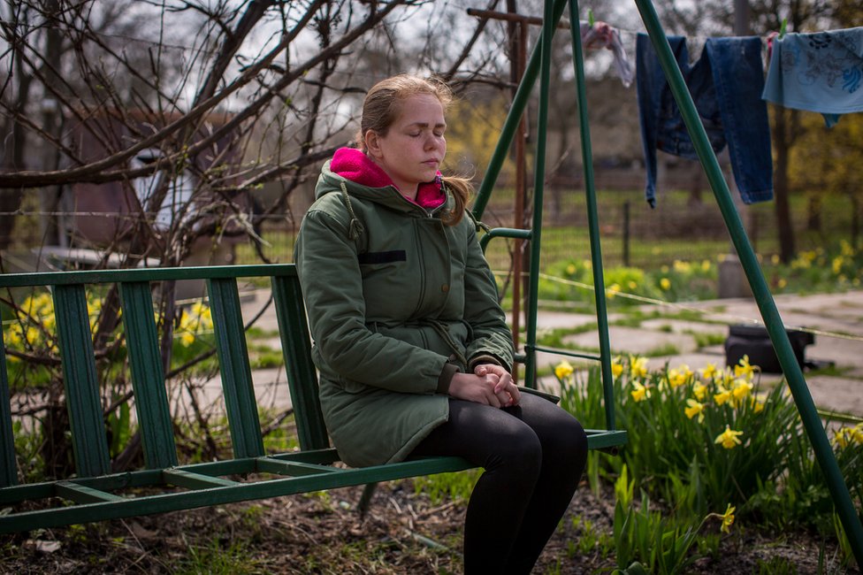 Maria Sayenko in her garden in Hurivshchyna. "It's like he disappeared into thin air," she said.