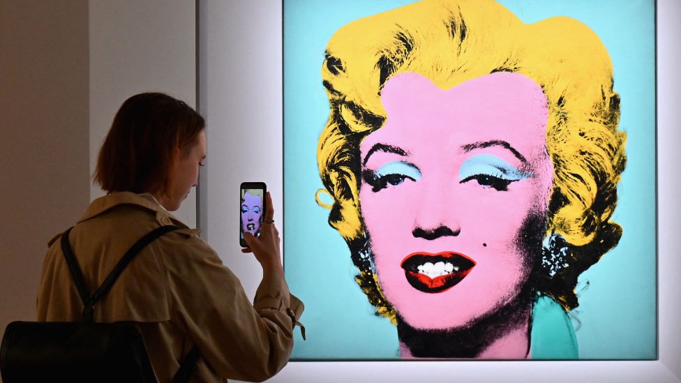 Andy Warhol's "Shot Sage Blue Marilyn" at an auction preview in April