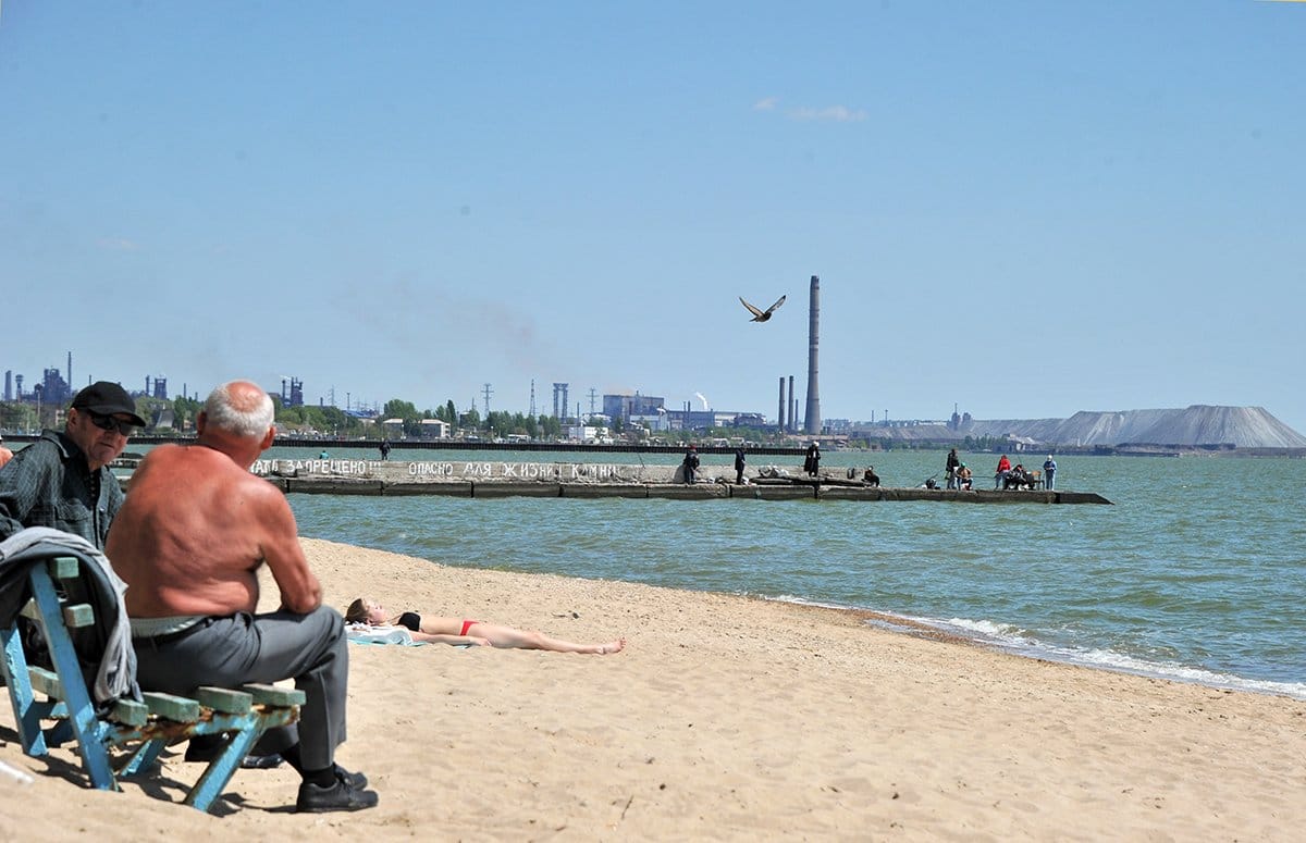 Sunbathing with the steelworks in the background