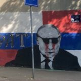 Putin (na muralu) dobio naočare ispod kojih "curi krv" (FOTO) 11
