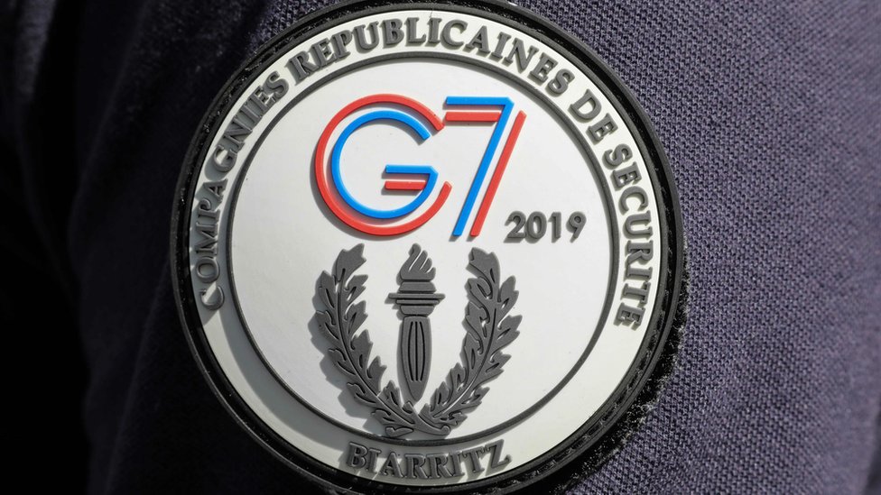 G7 badge