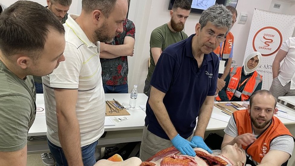 David Nott demonstrates surgical techniques on Heston, the medical dummy.