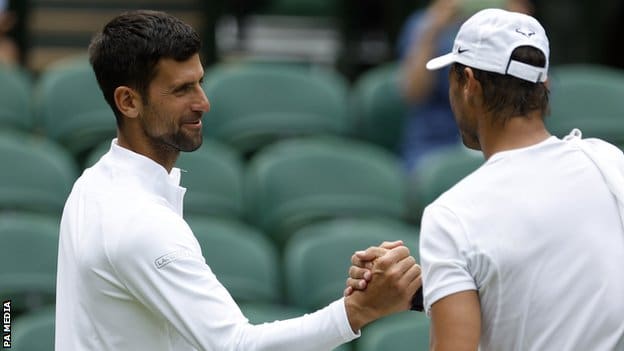 Novak Djokovic and Rafael Nadal shake hands at Wimbledon on Thursday