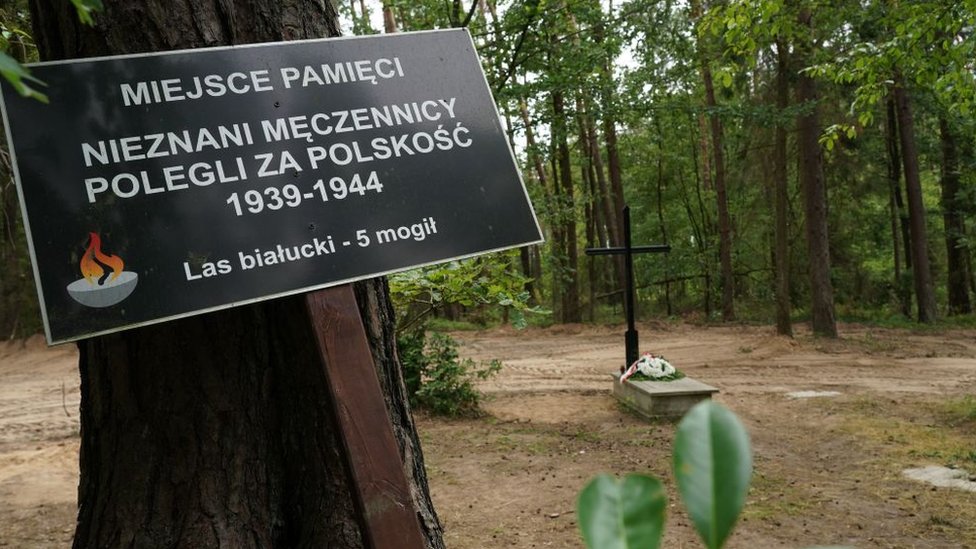 A symbolic grave in the Bialucki Forest near Ilowo on July 13, 2022